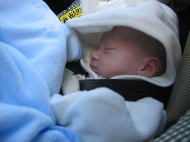 Owen in the car seat going home